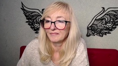 Blonde MILF with glasses on webcam