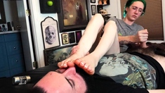 Brunette with foot fetish rubs big dick with her feet in POV