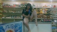 Russian MILF Fucks Herself with a Sex Toy in a Store