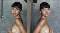 Petite brunette and Thai MILF strip nude