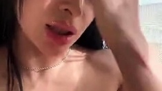 Brunette seductress working her big boobs and hot ass