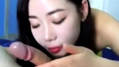 Asian blowjob and cum swallow