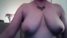 Mature busty brunette flahes her natural juicy melons